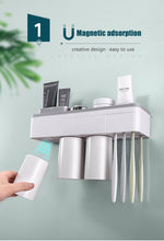 Load image into Gallery viewer, Magnetic Adsorption Inverted Toothbrush Holder
